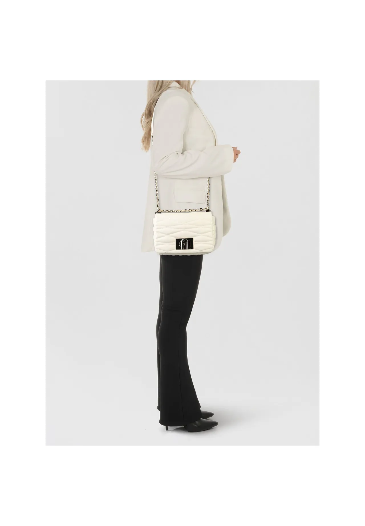 Elegante gesteppte Wellen-Schultertasche