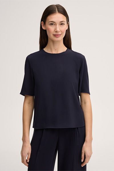 Minimalistische Krepp-Bluse mit Fransensaum