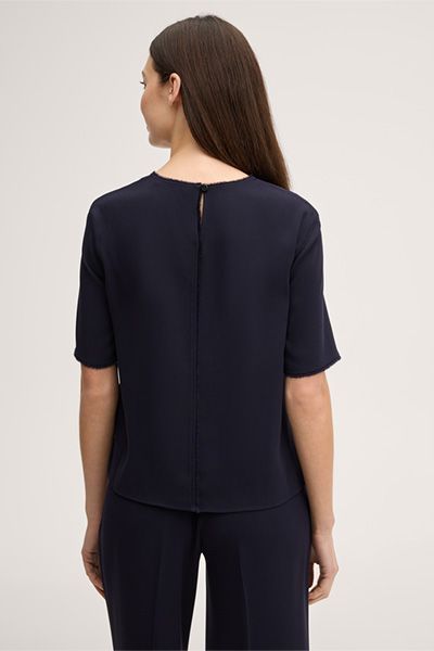 Minimalistische Krepp-Bluse mit Fransensaum