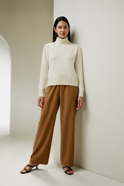 Rollkragenpullover mit geripptem Saum