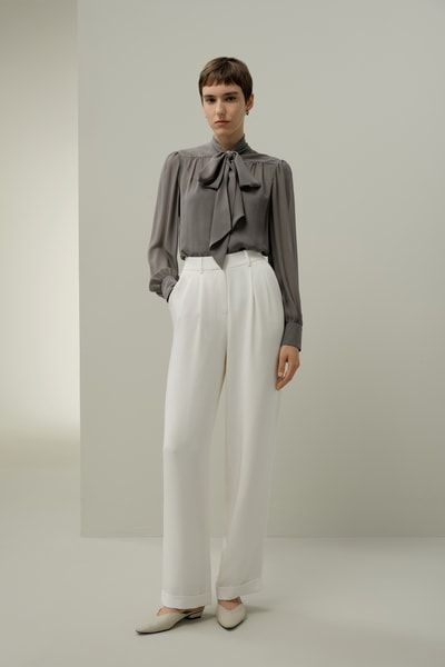 Elegante Seidenbluse mit Schluppenkragen