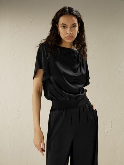 Elegantes Top in Peplos-Optik
