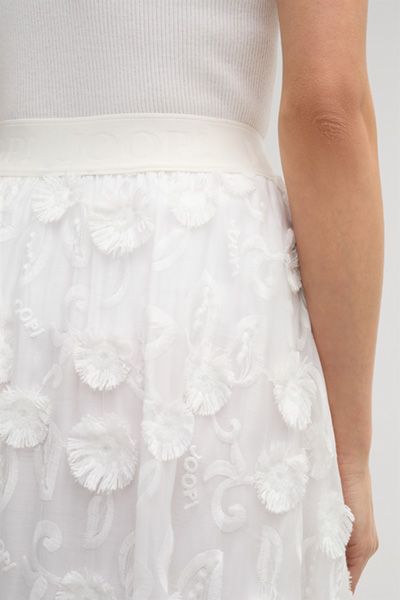 Eleganter Midirock mit Blütenapplikationen