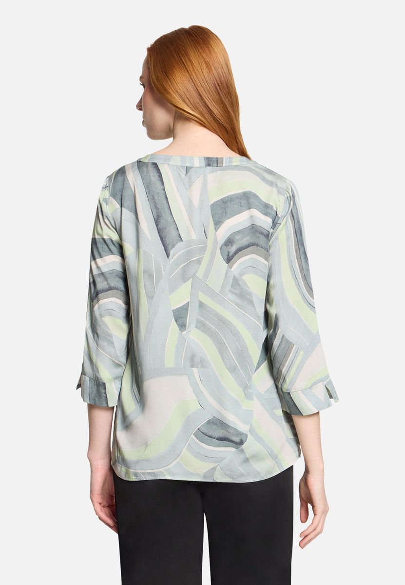 Schlupfbluse mit geometrischem Wellenmuster