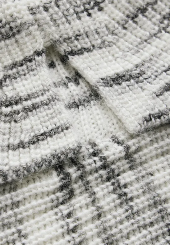 Entspannter melierter Rollkragenpullover aus Strick