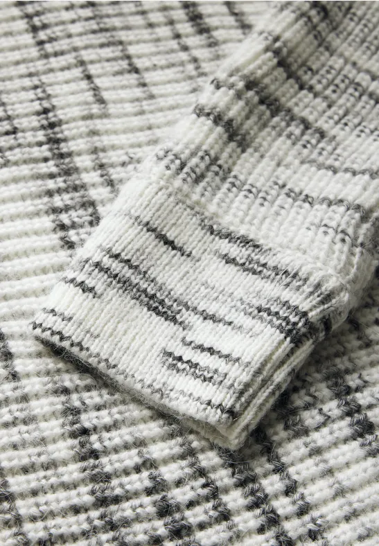 Entspannter melierter Rollkragenpullover aus Strick