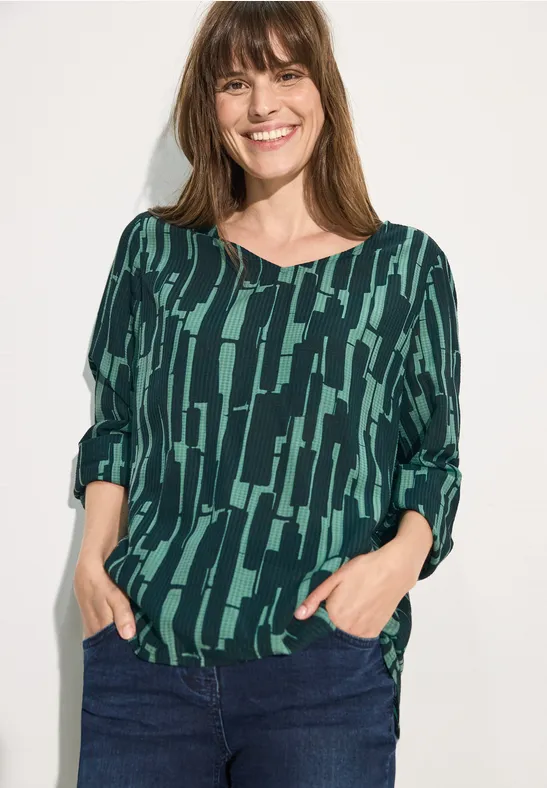 Bluse mit abstraktem geometrischem Muster