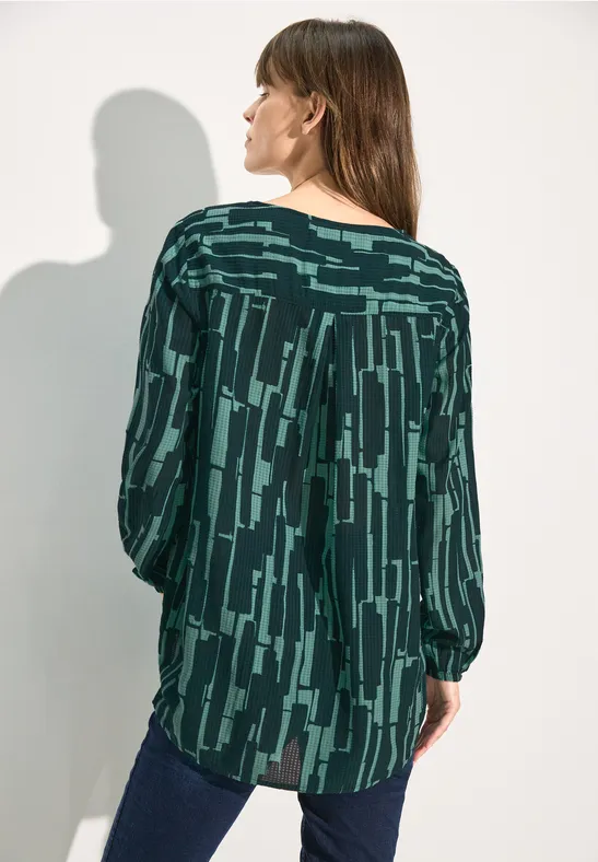 Bluse mit abstraktem geometrischem Muster