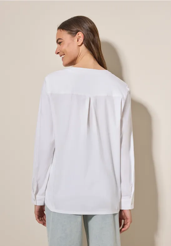 Bluse mit geschlitztem Rundhals