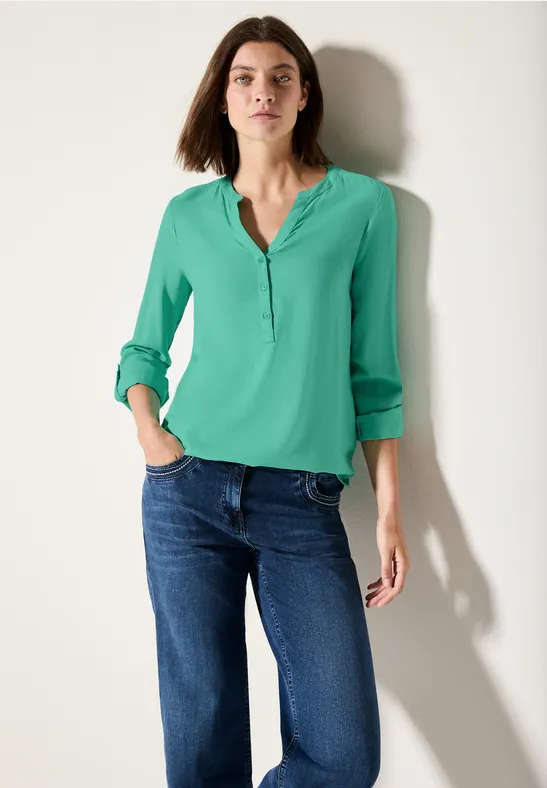 Leuchtende Viskosebluse mit Knopfleiste