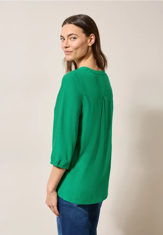 Leuchtende Viskosebluse mit Knopfleiste