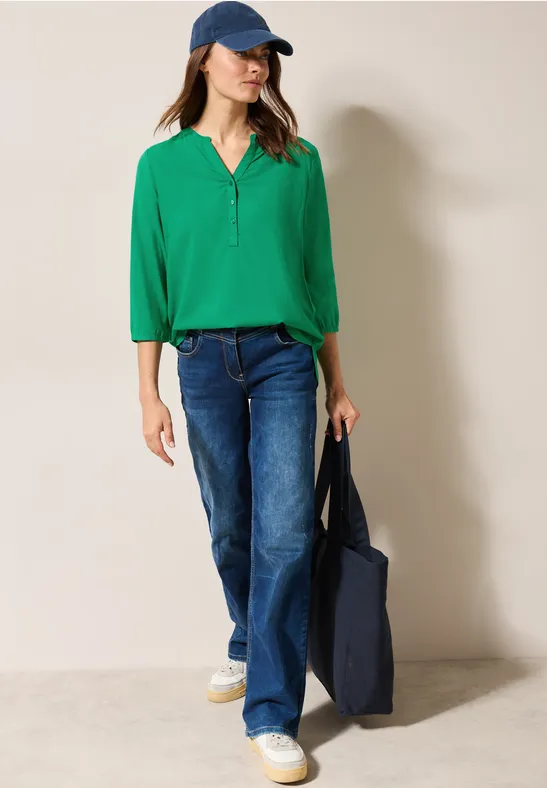 Leuchtende Viskosebluse mit Knopfleiste