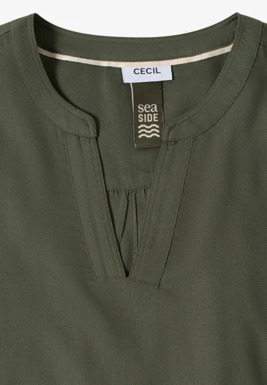 Leuchtende Viskosebluse mit Knopfleiste