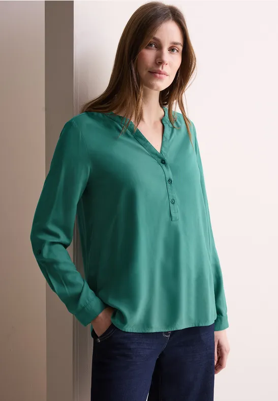 Leuchtende Viskosebluse mit Knopfleiste