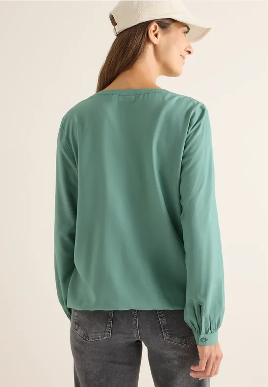 Bluse mit geschlitztem Ausschnitt