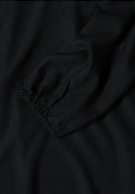 Fließende Tunika mit Split-Neck