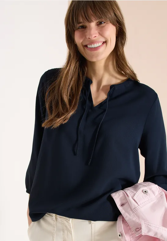 Dobby-Bluse mit geschlitztem Ausschnitt