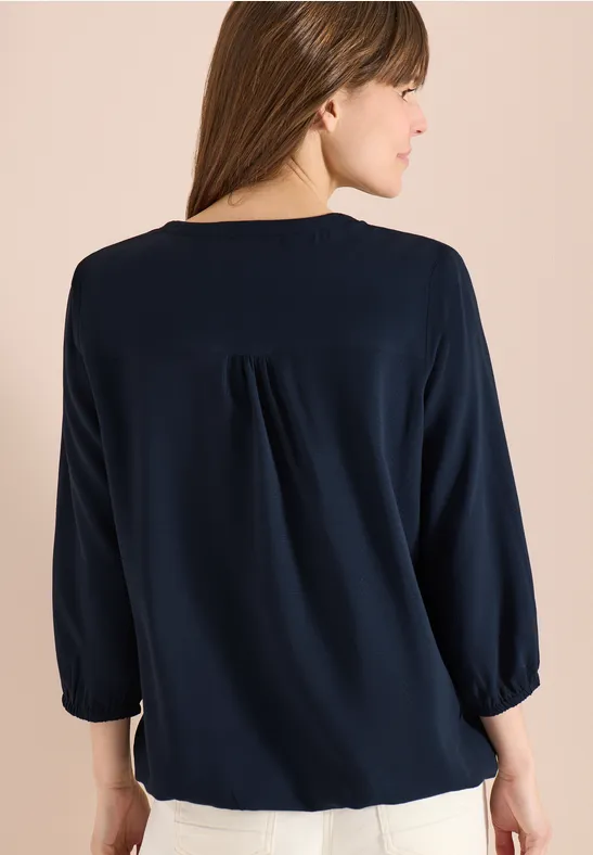 Dobby-Bluse mit geschlitztem Ausschnitt
