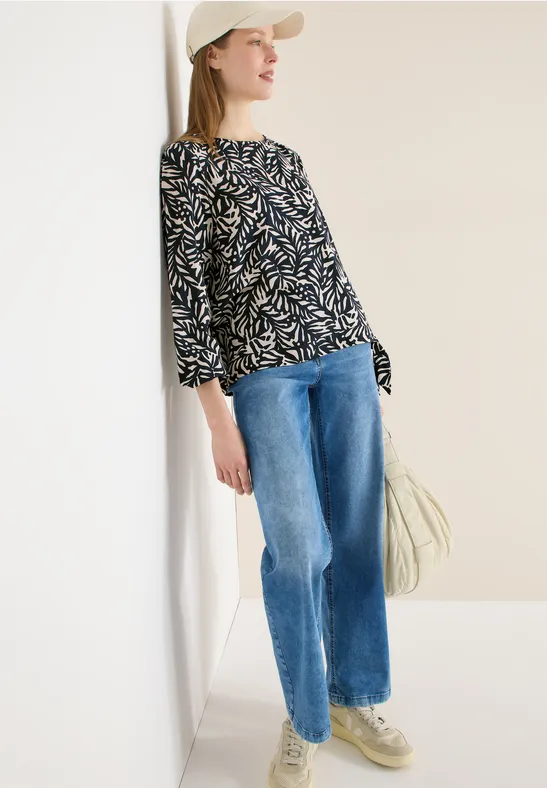 Bluse mit grafischem Blättermuster und Knotendetail