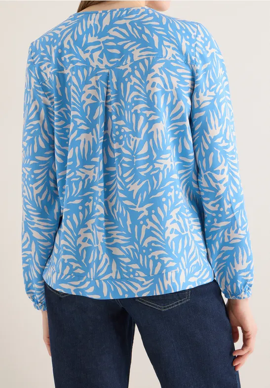 Bluse mit grafischem Blättermuster und Knotendetail