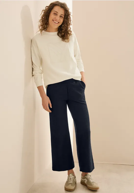 Weit geschnittene Bouclé-Strickhose