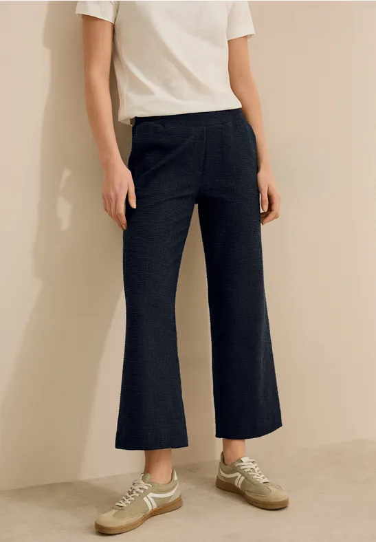 Weit geschnittene Bouclé-Strickhose
