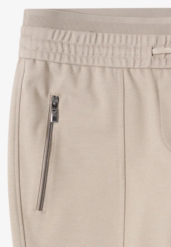 Schmal geschnittene Hose mit Tunnelzug