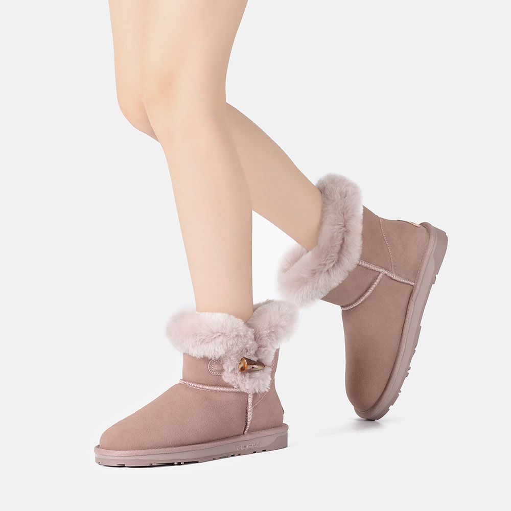 Mini-Stiefel mit Schafsfell und Hornknebel