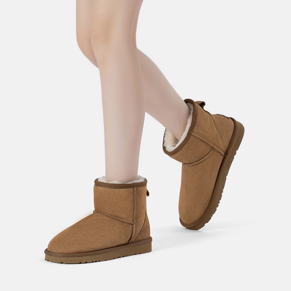 Gemütliche Mini Wildleder Lammfellstiefel