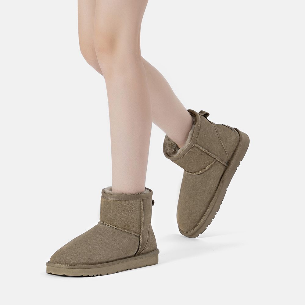 Gemütliche Mini Wildleder Lammfellstiefel