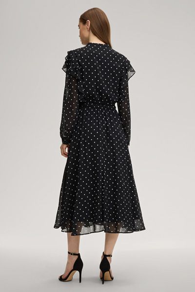 Elegantes gepunktetes Midikleid mit Volants