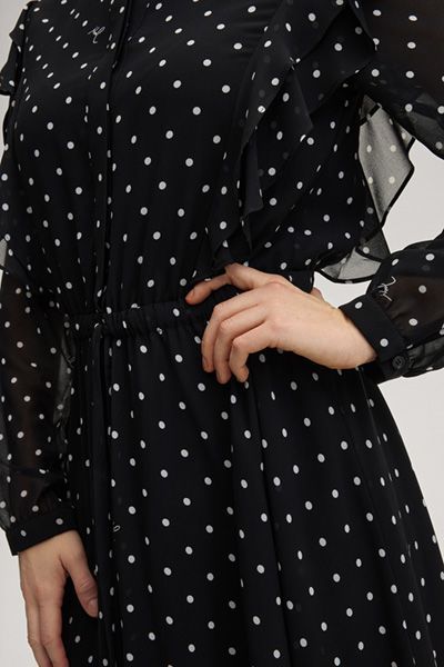 Elegantes gepunktetes Midikleid mit Volants