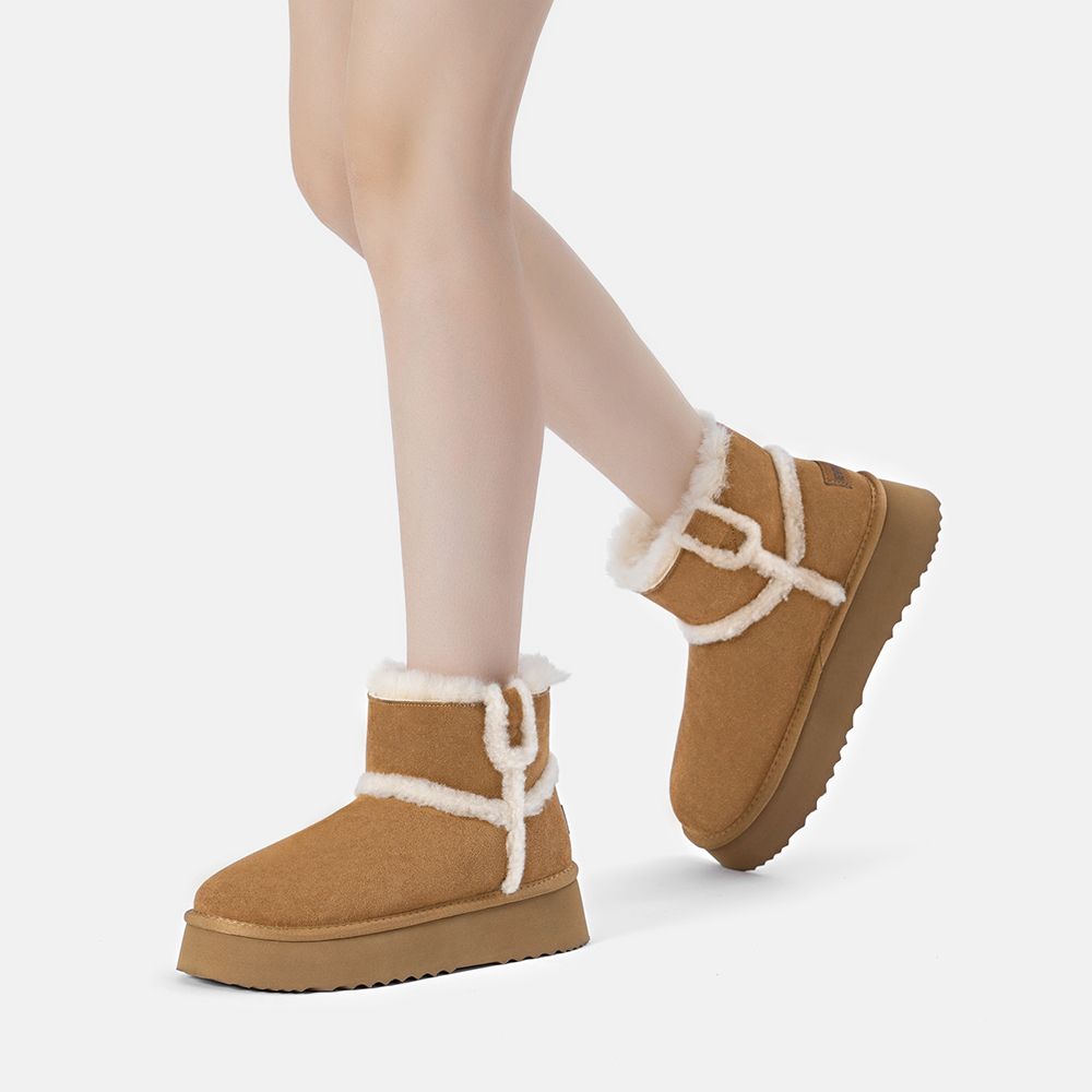 Plateau-Stiefeletten aus Wildleder mit Lammfell