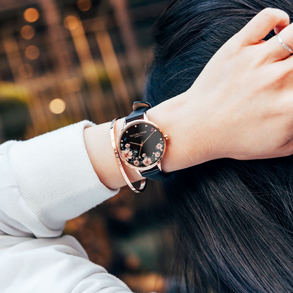 Armbanduhr mit floralem Zifferblatt