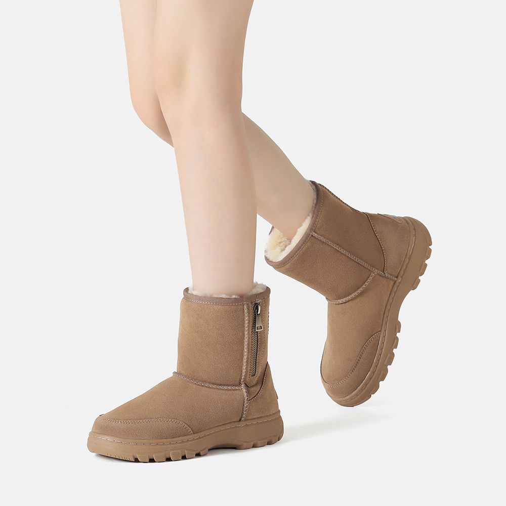 Kurze Lammfellstiefel mit Reißverschluss