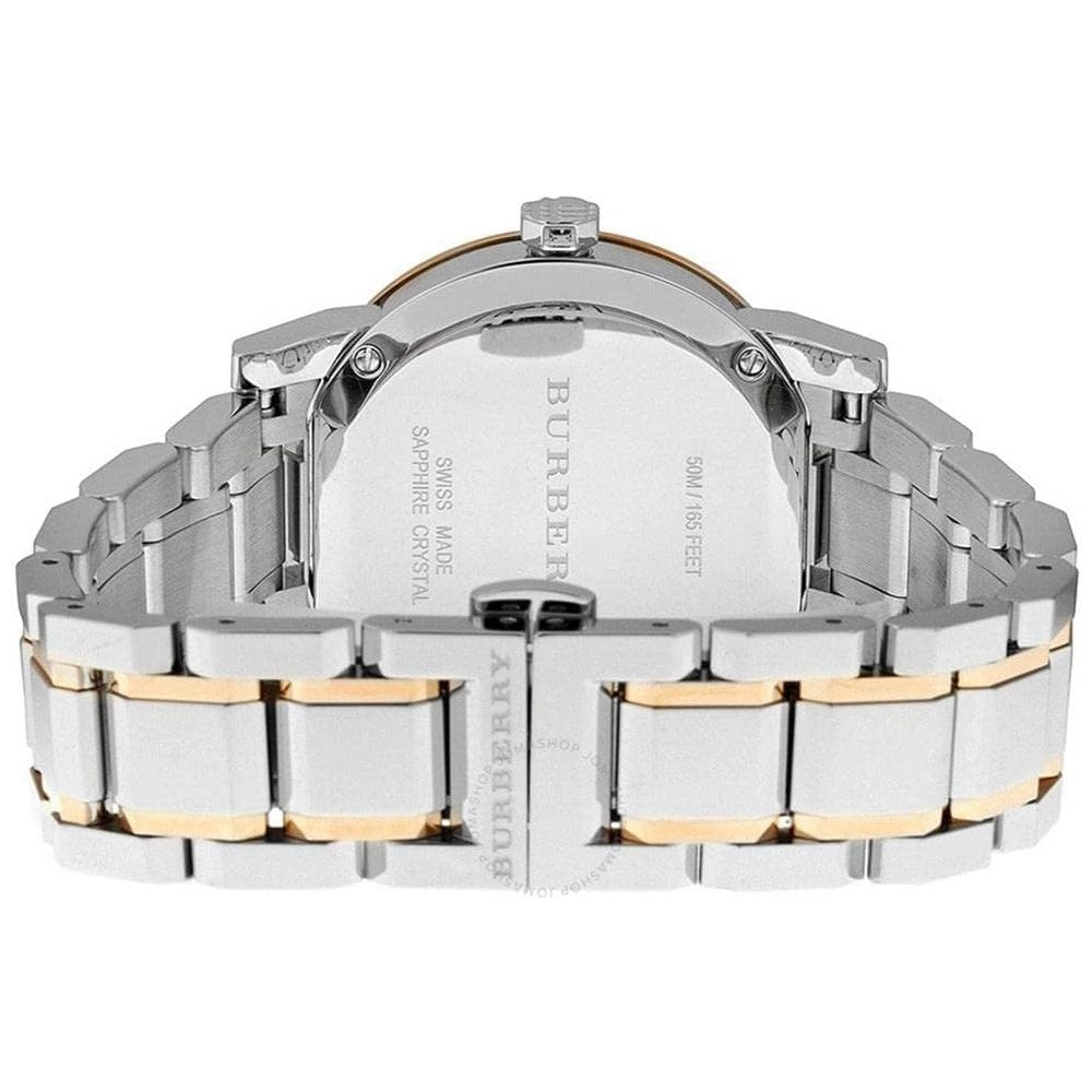 Elegante zweifarbige Uhr mit Diamantindizes