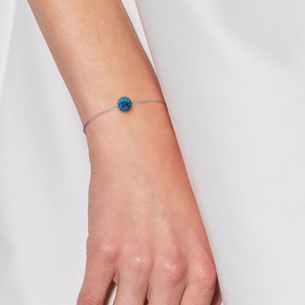 Filigranes Armband mit Kristallkugel