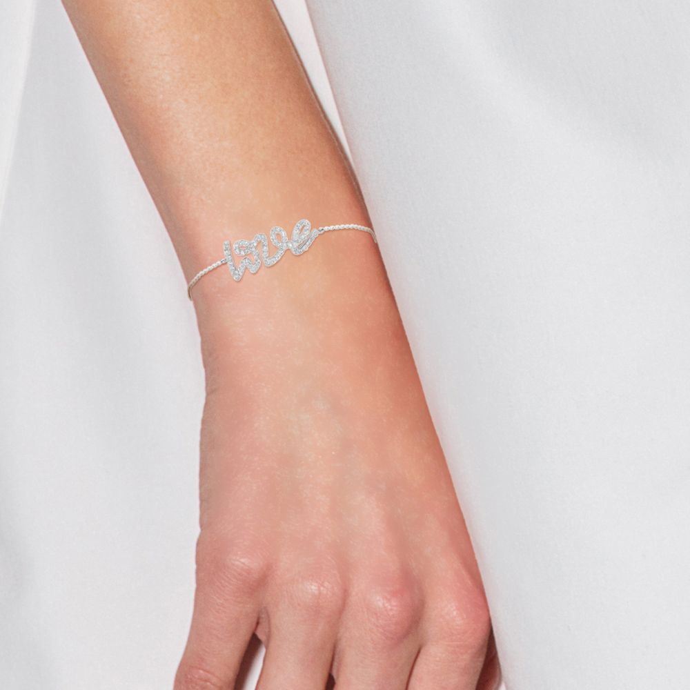 Pave-Armband mit Love-Schriftzug