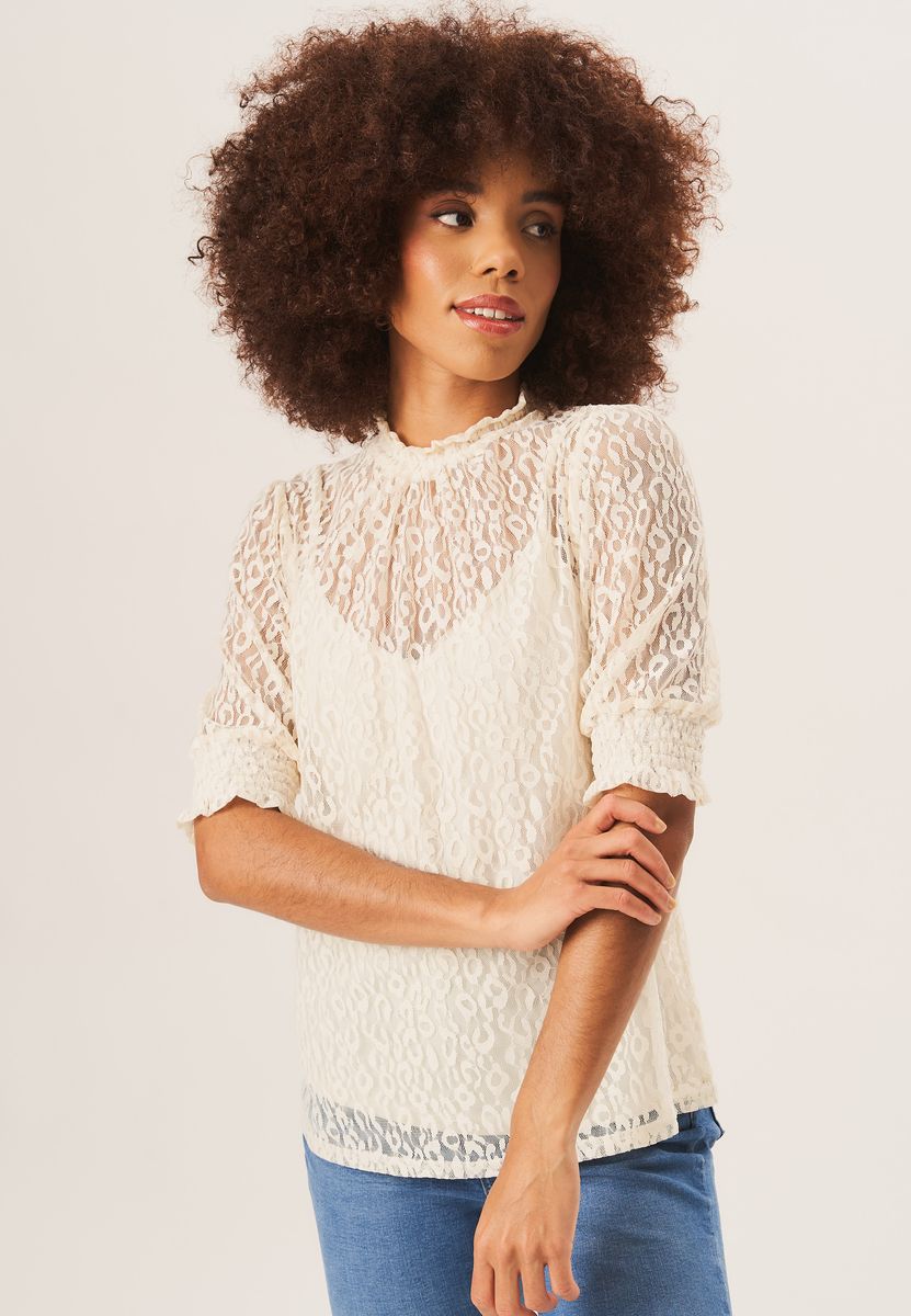 Hochgeschlossene Spitzenbluse mit Leopardenmuster