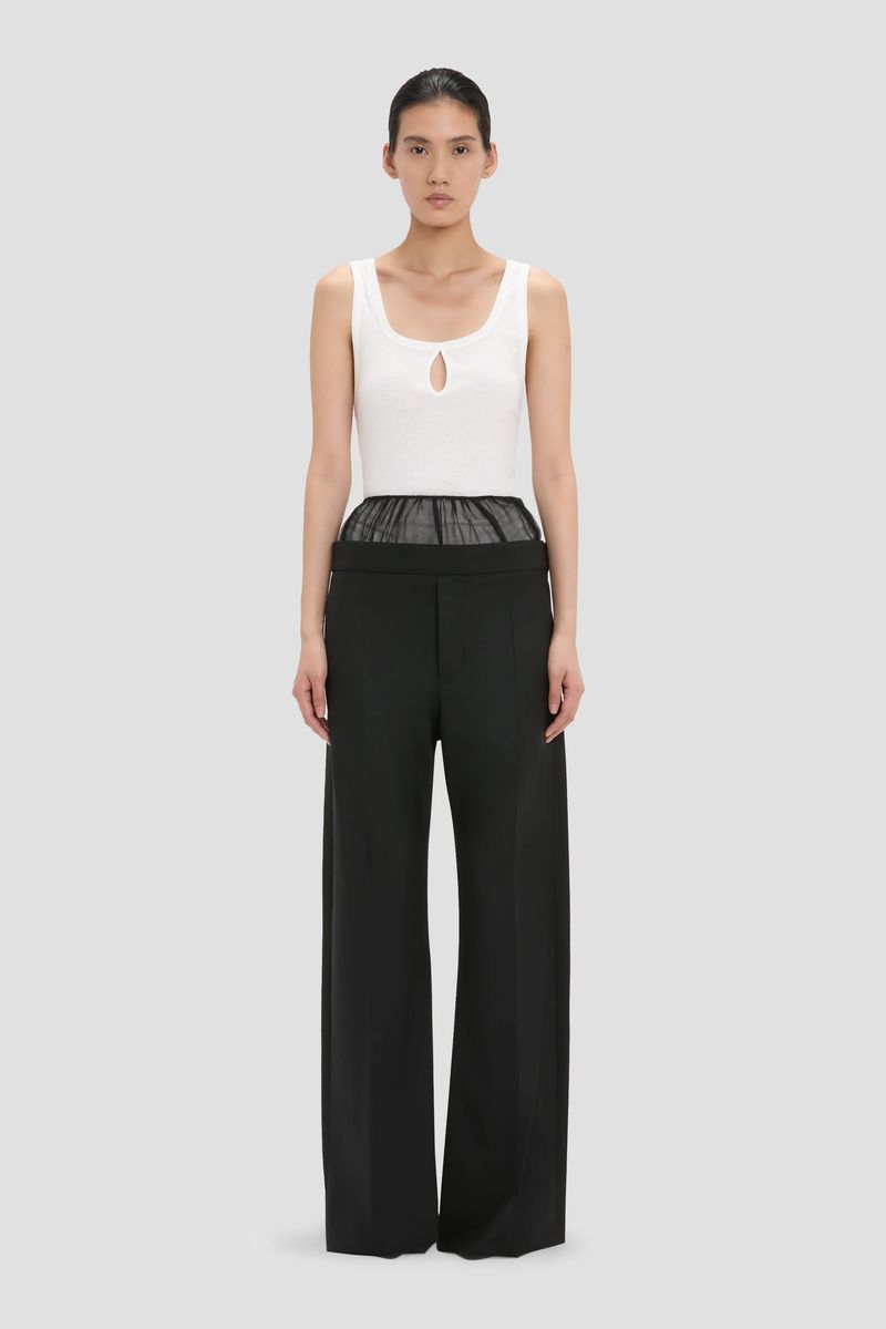 Weite Hose mit transparentem Tailleneinsatz