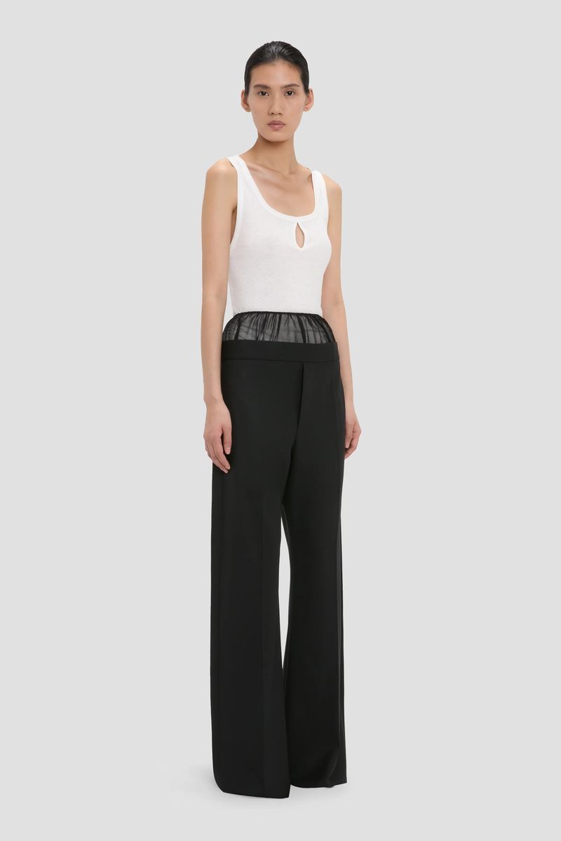 Weite Hose mit transparentem Tailleneinsatz