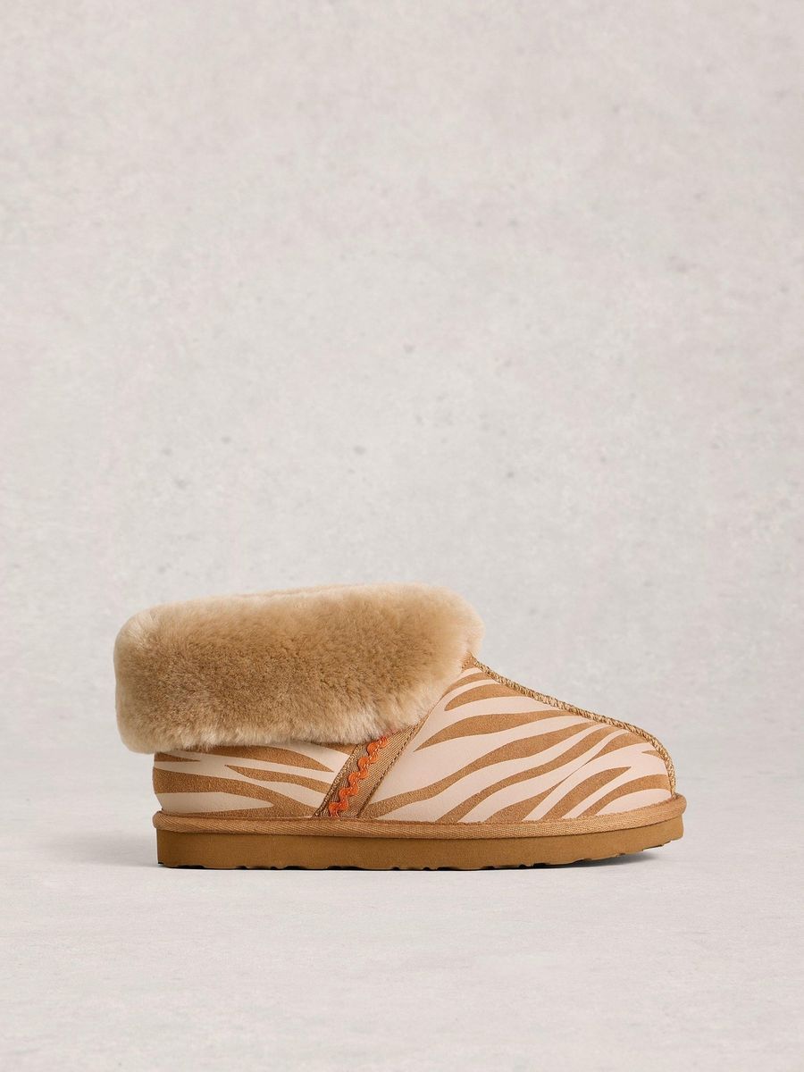 Suede-Stiefeletten mit Zebra-Print und Schafsfell