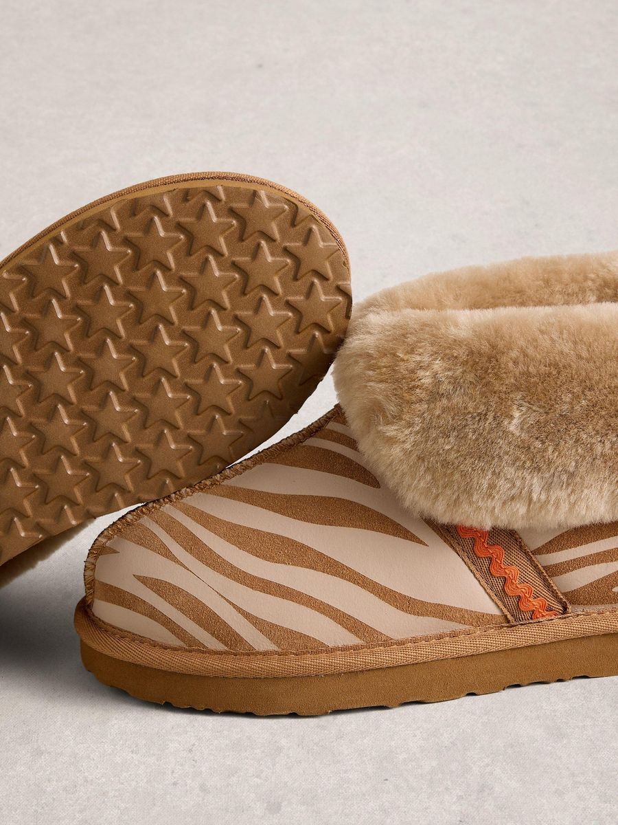 Suede-Stiefeletten mit Zebra-Print und Schafsfell