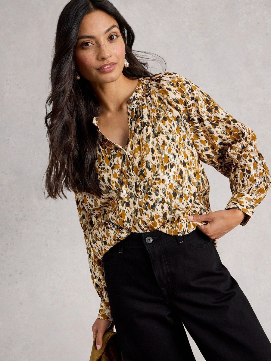 Schimmernde Bluse mit abstraktem Muster