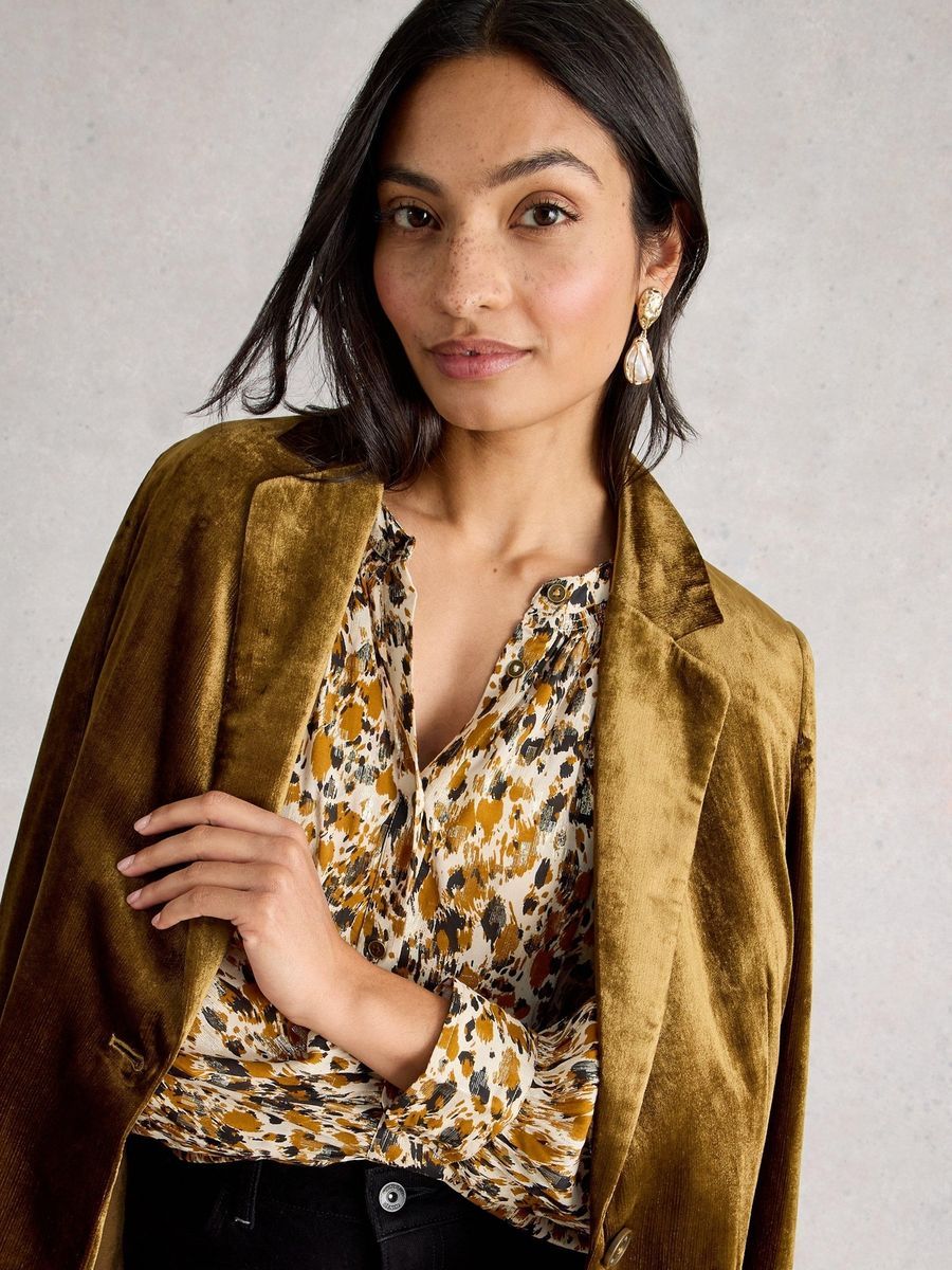Schimmernde Bluse mit abstraktem Muster