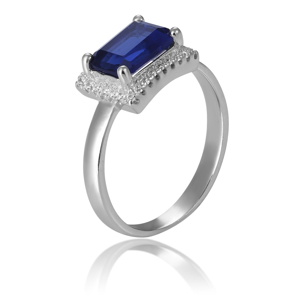 Eleganter Halo-Ring mit Smaragdschliff