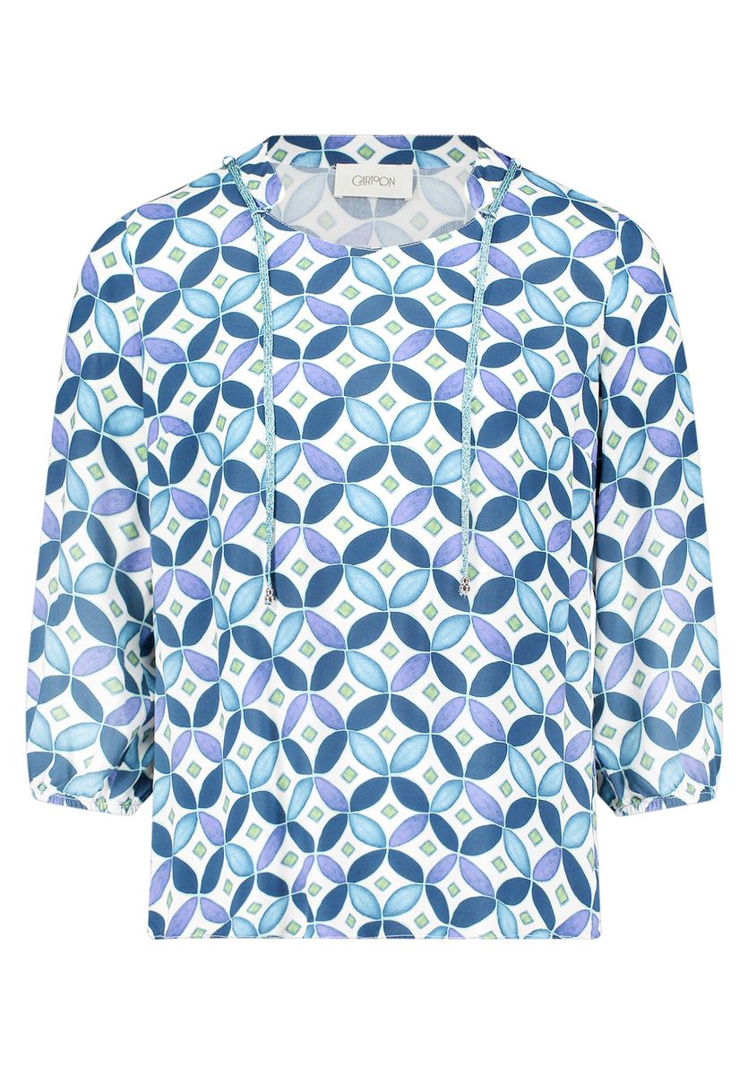 Bluse mit geometrischem Kachelmuster