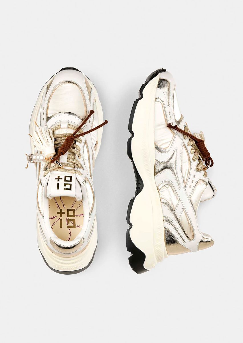 Chunky-Sneaker mit Metallic-Details und Quasten