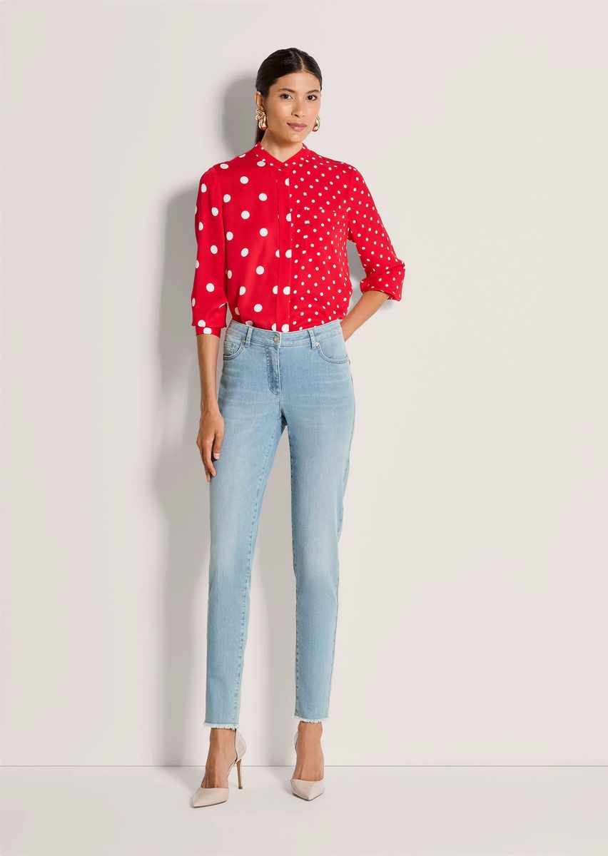Slim-Line-Jeans mit Fransensaum