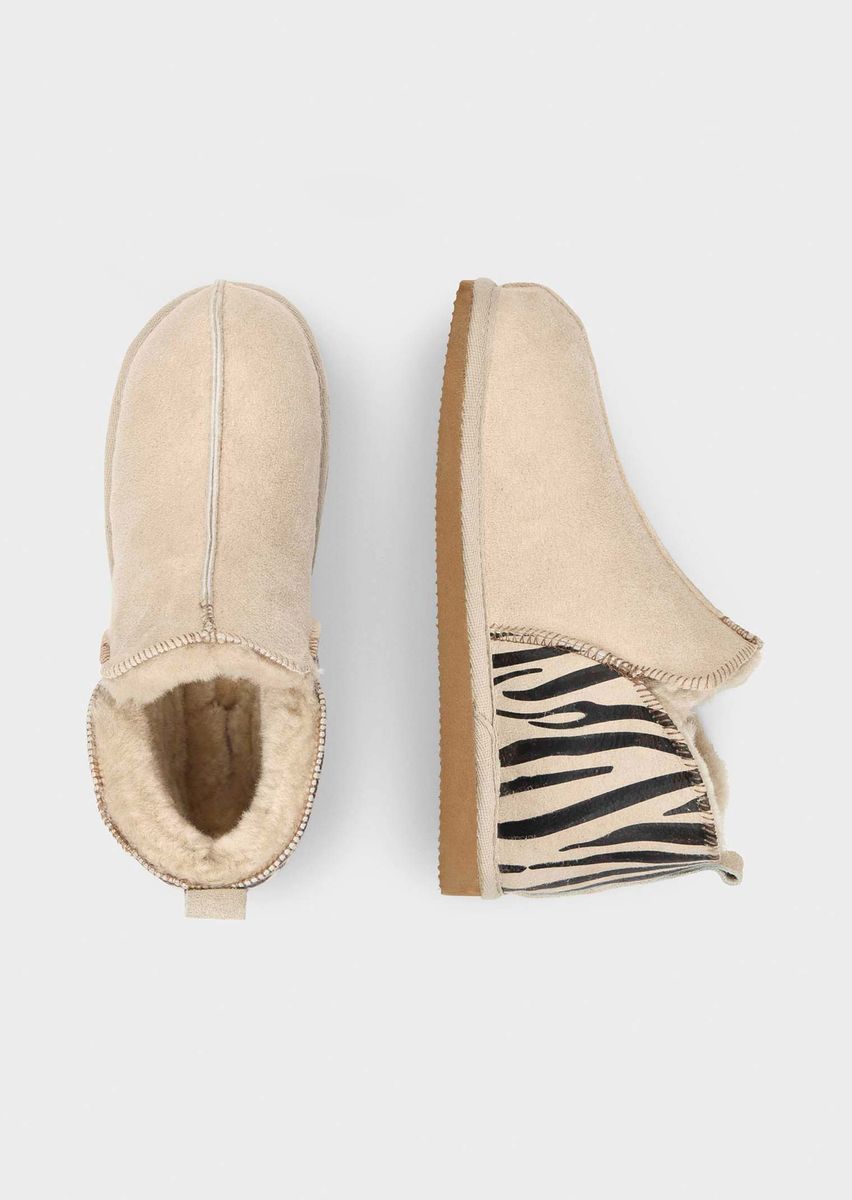 Lammfell-Hausschuhe mit Zebra-Ferse